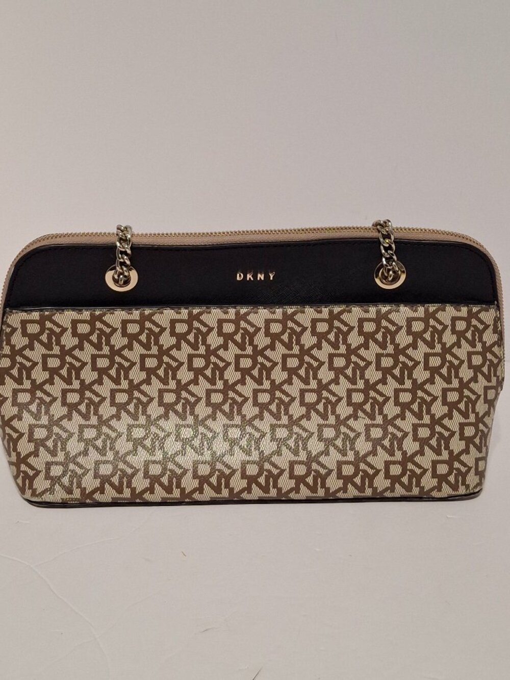 Natural woven straw-style shoulder bag with a beautiful textured geometric weave
